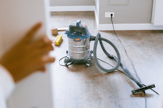 Industrial vacuum cleaner in a newly renovated apartment for a spotless finish.